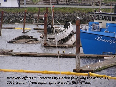 Photo of sunken boat in Crescent City Harbor following the March 11, 2011 tsunami from Japan (photo credit: Rick Wilson, CGS)