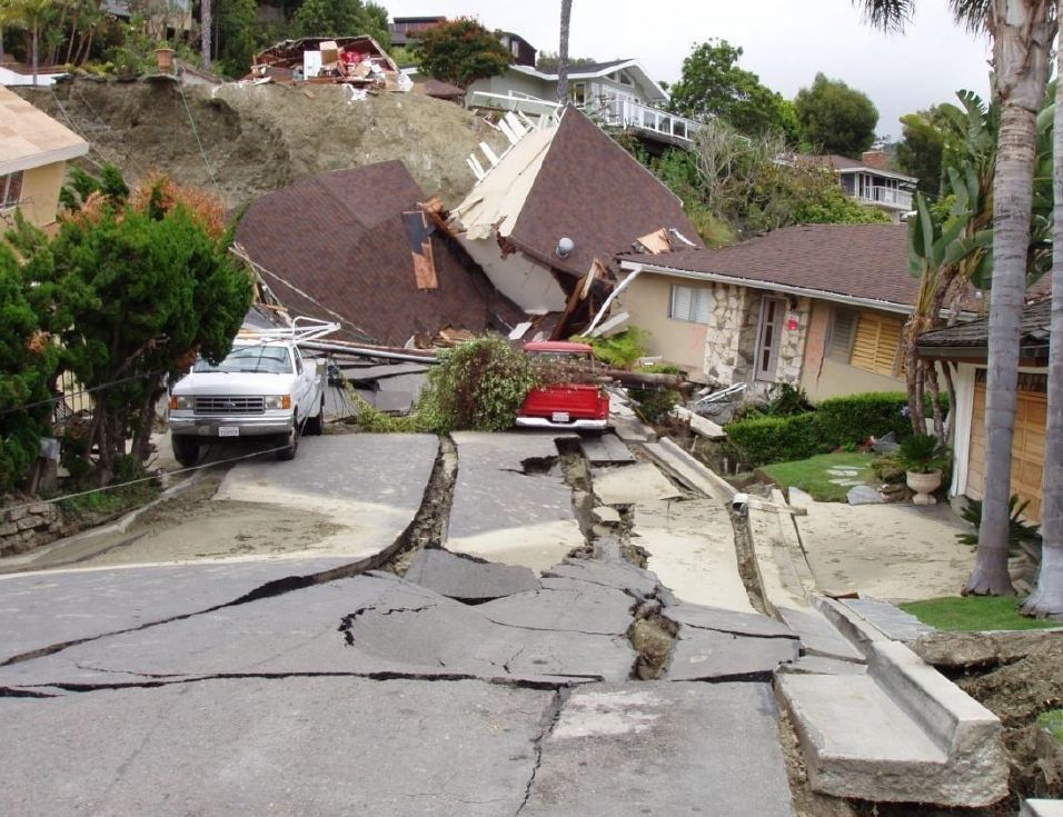 Photo of collapsed homes in Bluebird Canyon during a slow moving landslide
