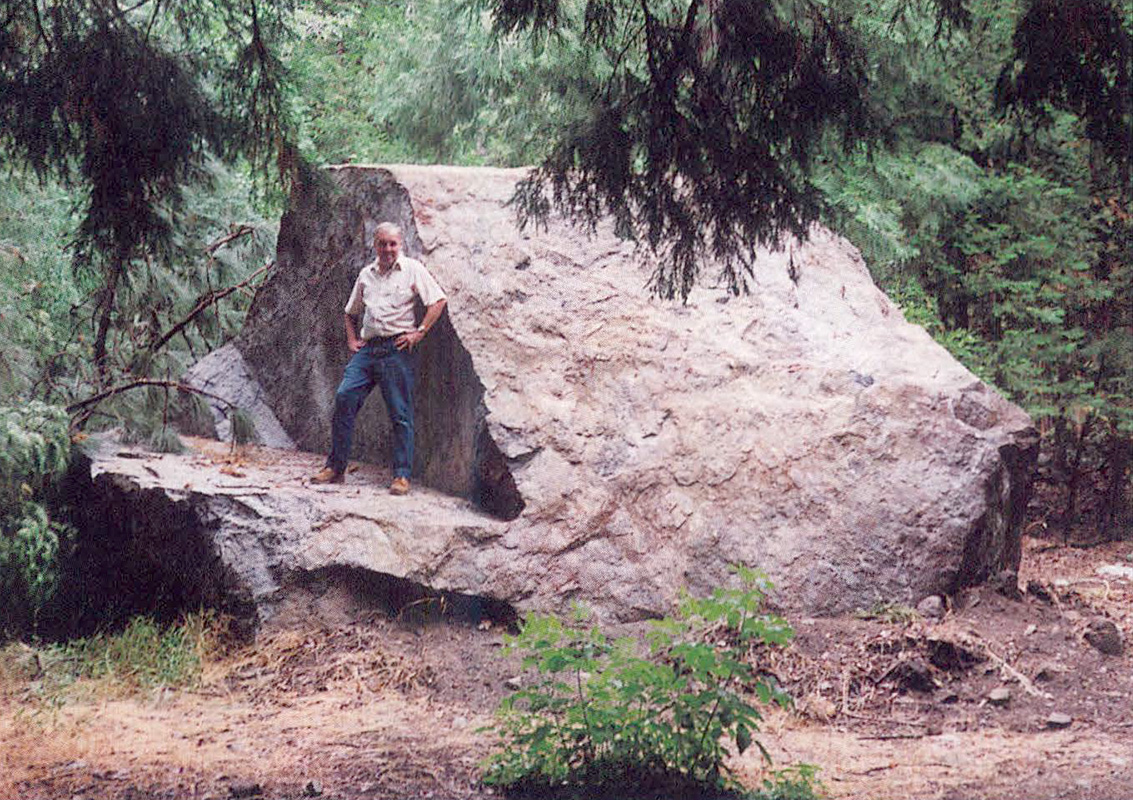 This boulder rolled down the steep south side of Mill Creek Canyon into the back yard of a home.