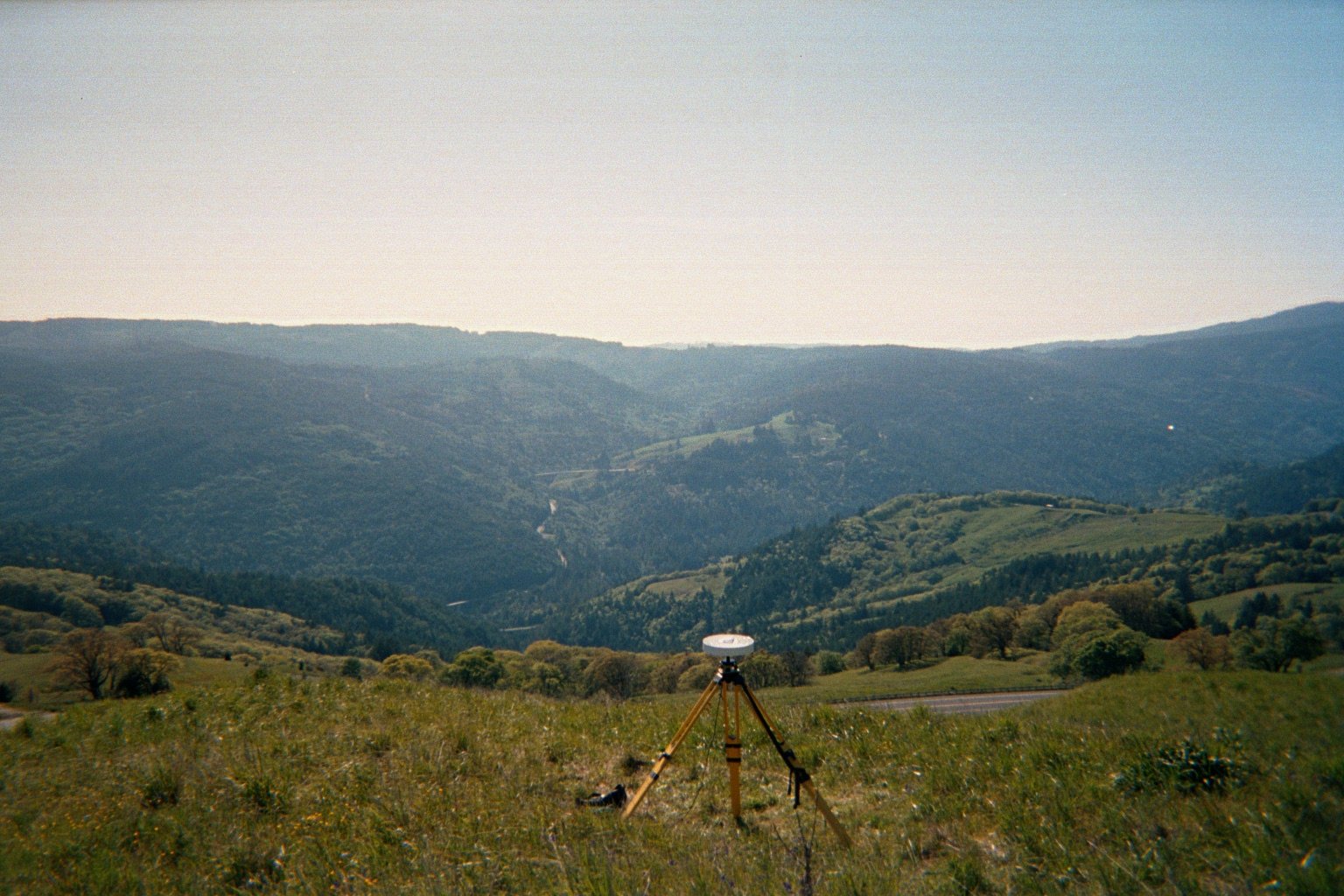 A surveyor's tripod erected on a hillside above Highway 299 in Humboldt county.