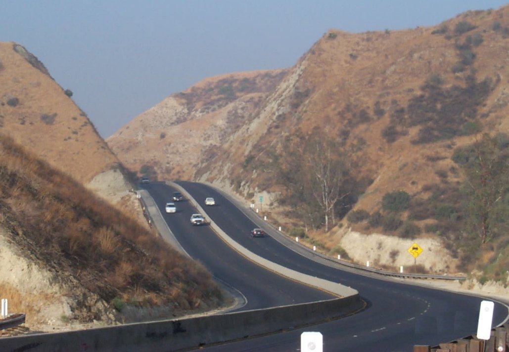 Highway 60 cuts through rugged terrain in Riverside county.