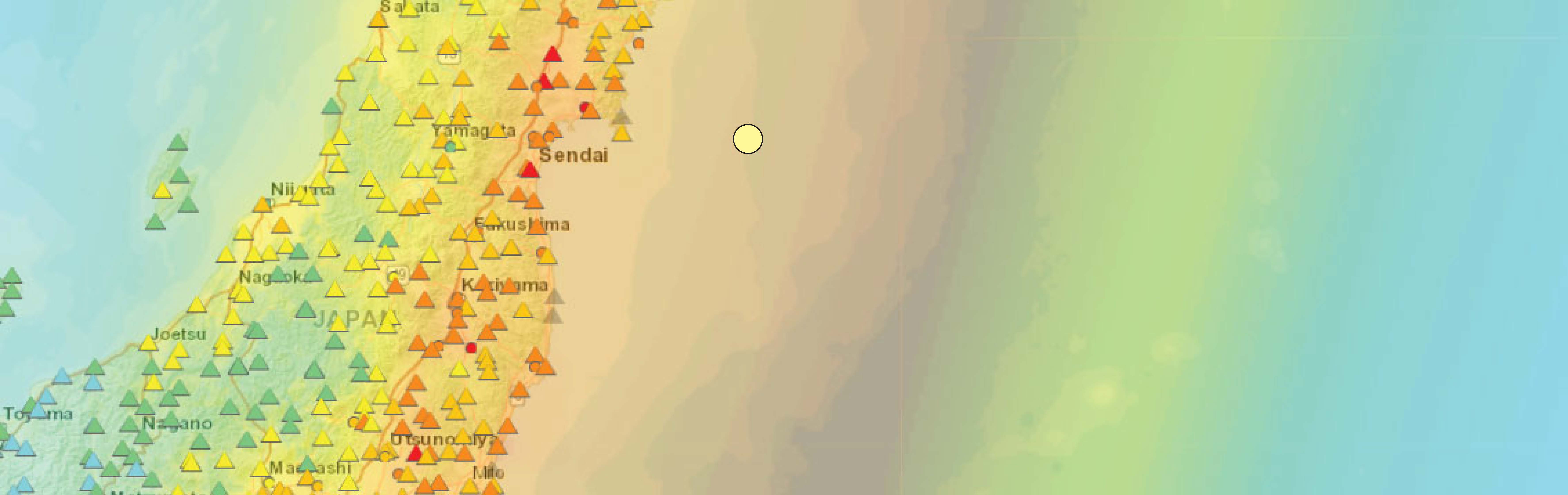 The earthquake intensity model is displayed as a spectrum of color with intensity observations plotted as triangles and the Tōhoku Earthquake epicenter plotted in the center.