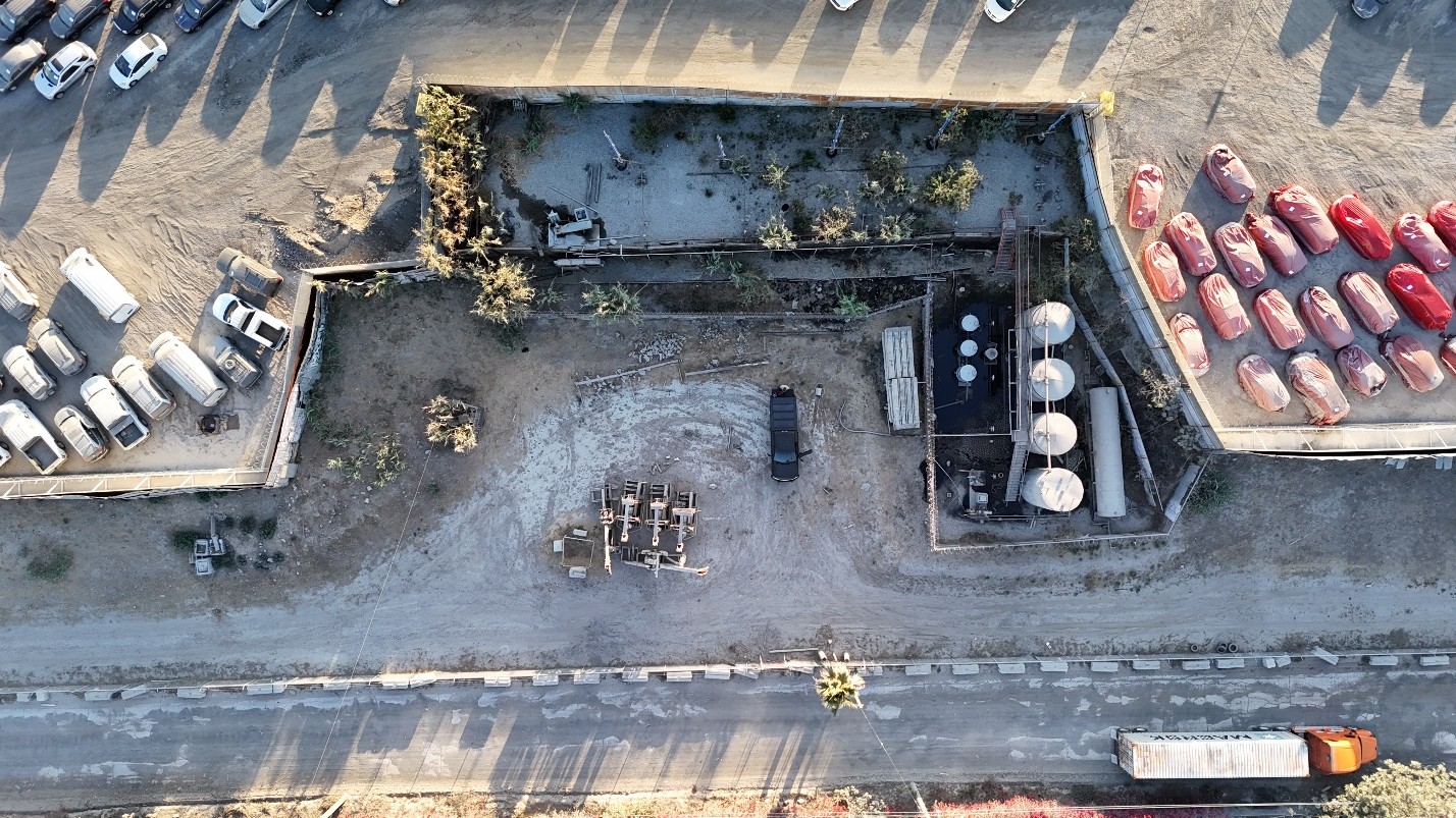 Aerial photo above depicts the work site conditions prior to the commencement of plug and abandonment operations)