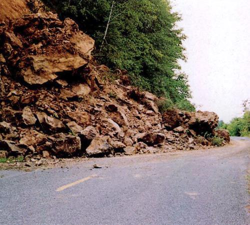 Landslide debris on road.