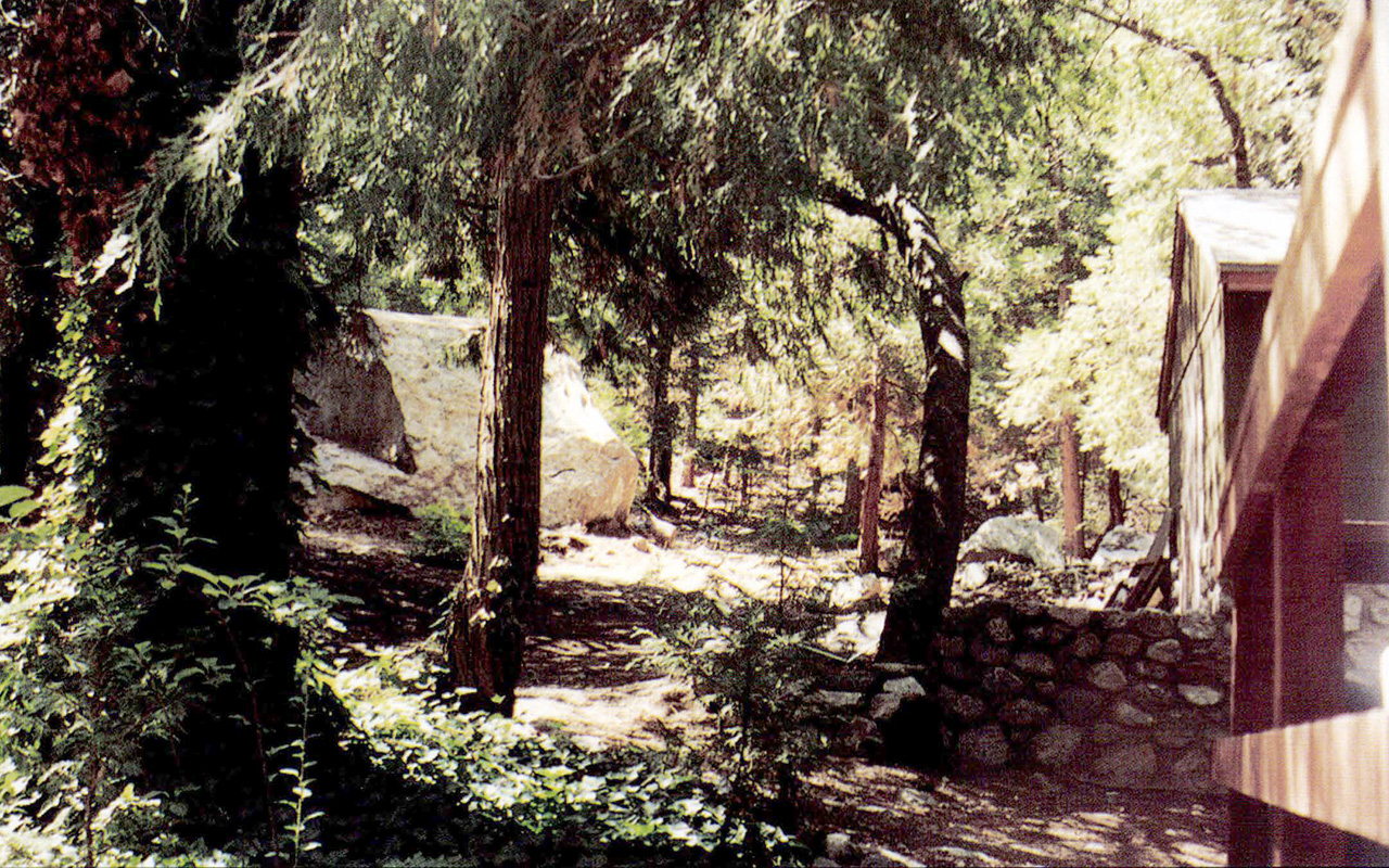 5. A room-sized boulder near a house.